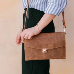 Hoi An Real Leather - Da Bao Real Leather: Small Vintage Style leather purse to carry over your shoulder or crossbody. Big silver button makes for an elegant touch.