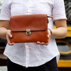 Hoi An Real Leather - Da Bao Real Leather Hoi An: Classic brown leather clutch bag for every occasion