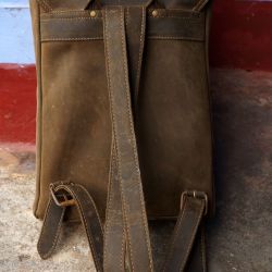 Hoi An Real Leather - Da Bao Real Leather Hoi An: Back view of bootstrap backpack, showing high quality craftsmanship of stitching.