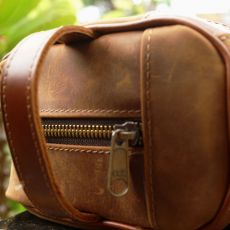 Hoi An Real Leather - Da Bao Real Leather: Big size toiletry bag, made of suede buffalo leather. Close-up of zipper and loop.