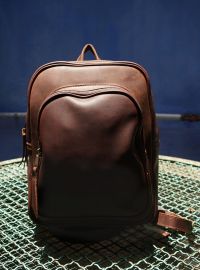 Hoi An Real Leather - Da Bao Real Leather: Dark purple Buffalo Leather backpack with big outer pocket, closing with a zipper..