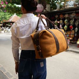 Hoi An Real Leather - Da Bao Real Leather: Small travel bag for a weekend away. Made of natural brown buffalo leather. Hoi An Real Leather - Da Bao Real Leather: Small travel bag for a weekend away. Made of natural brown buffalo leather. For men and women.